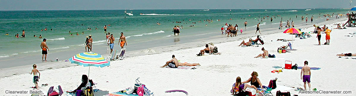 People enjoying Clearwater's awesome beach - swimming, boating, strolling, sunbathing . . .